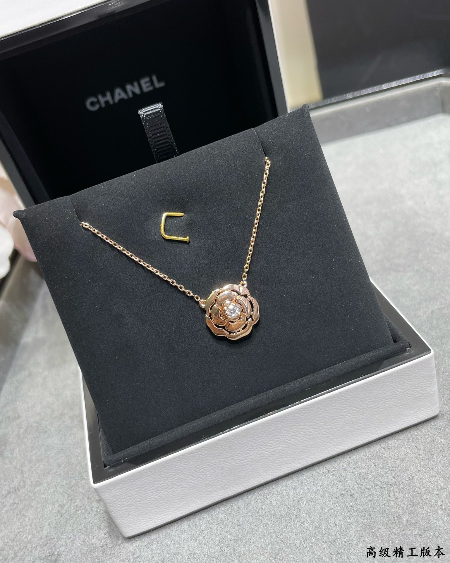 Ch*el camellia japonica necklace